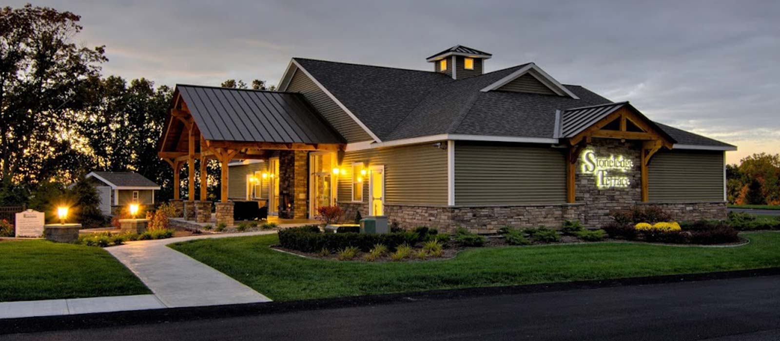 Clubhouse lit up at dusk